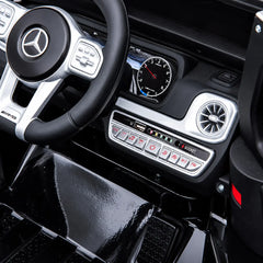 Mașinuță Electrică KIDOO pentru Copii Mercedes-Benz AMG G63, Licență Oficială, 12V, 2 Motoare x 30W, Telecomandă Parentală 2.4G, Bluetooth, USB, Radio FM, Faruri LED, Suspensii, Centură de Siguranță, 3–5 km/h, 105 x 65 x 55 cm